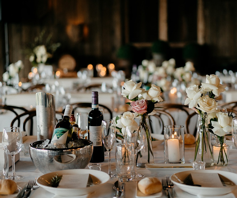 guest table wedding styling flowers and candles