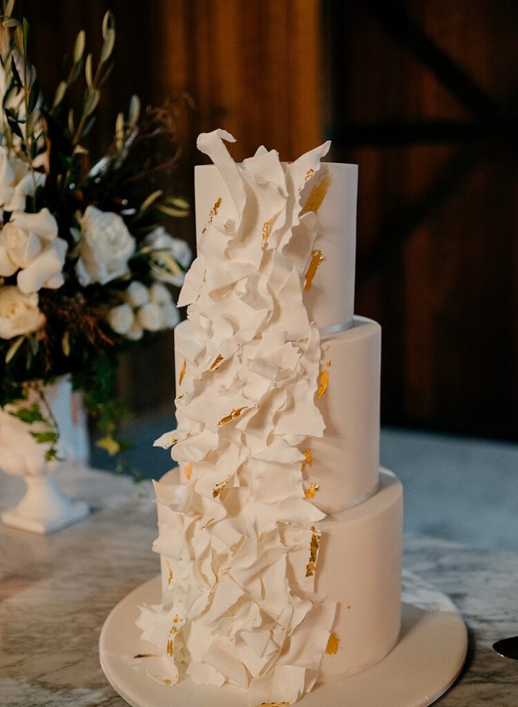 wedding cake with floral arrangement