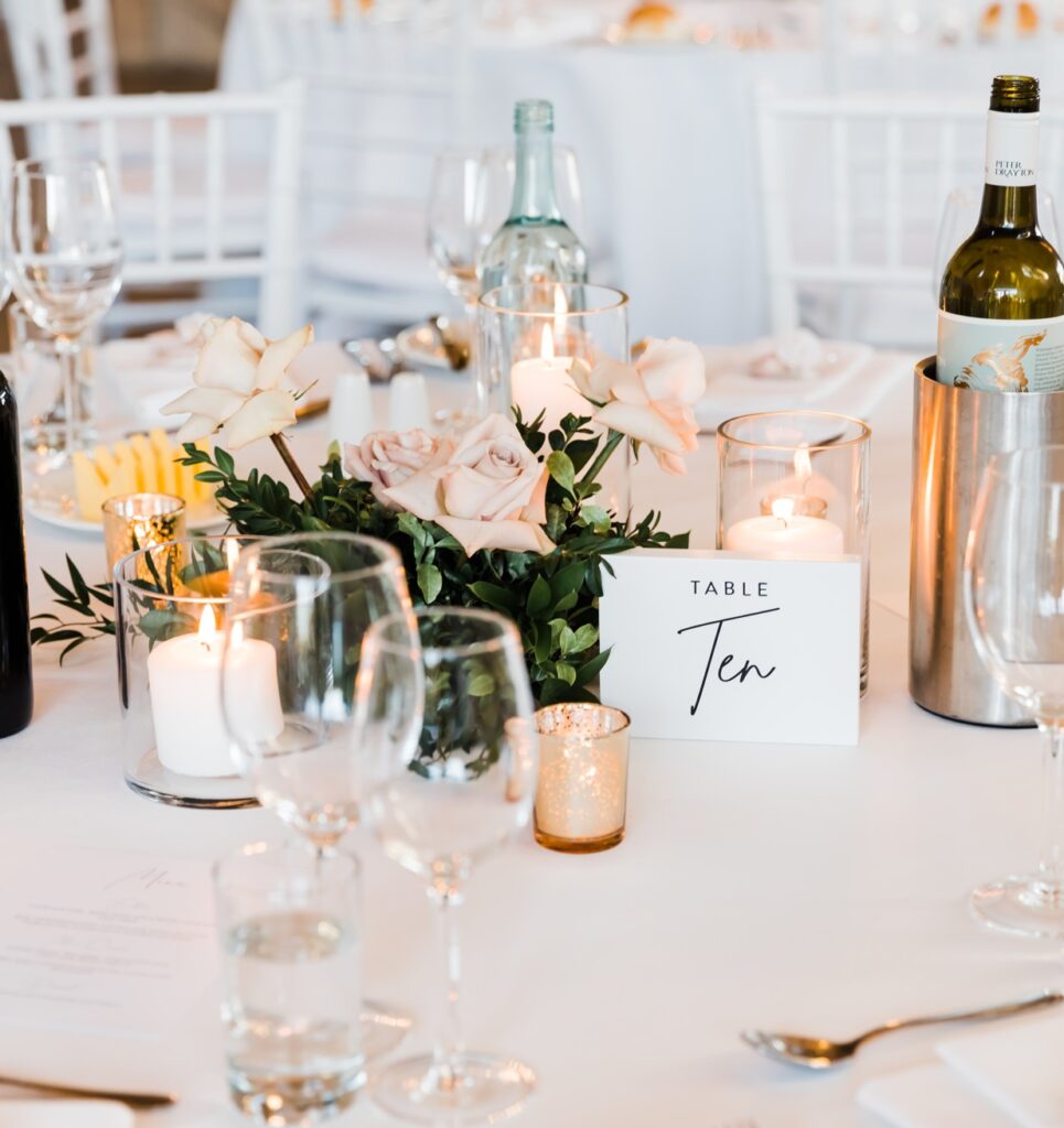 wedding reception guest table floral centerpiece