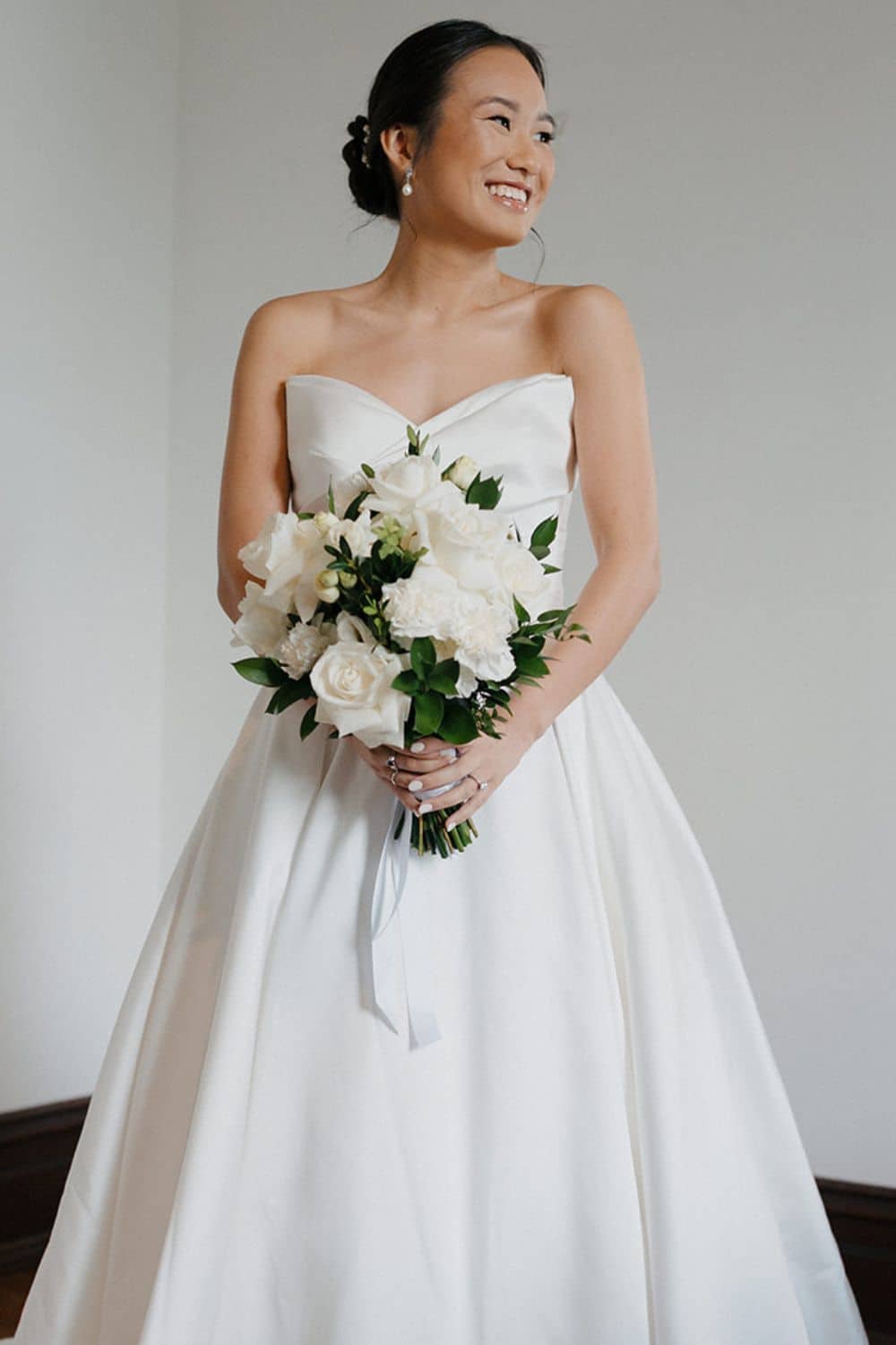 White flowers and greenery wedding bouquet